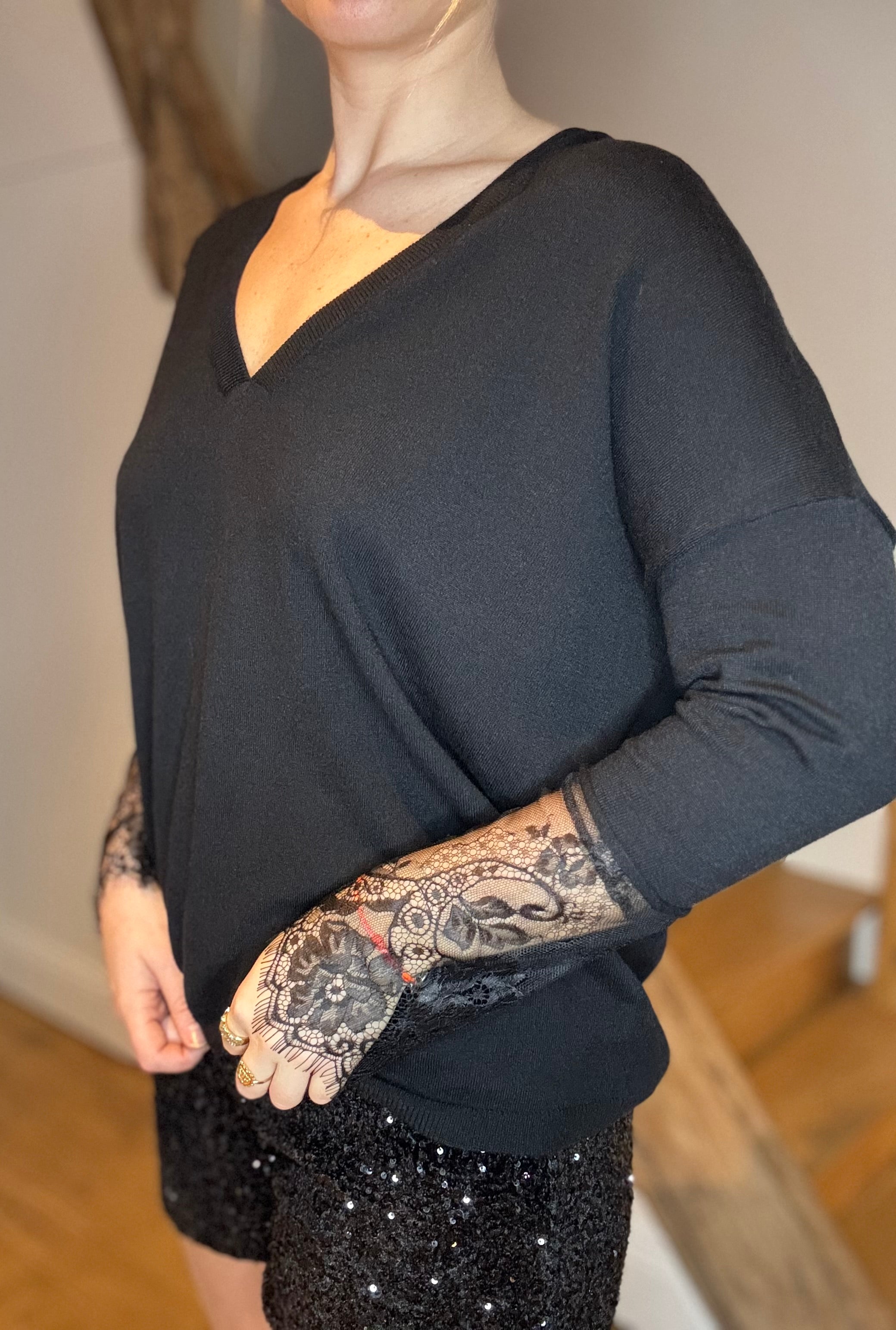Pull noir raffiné