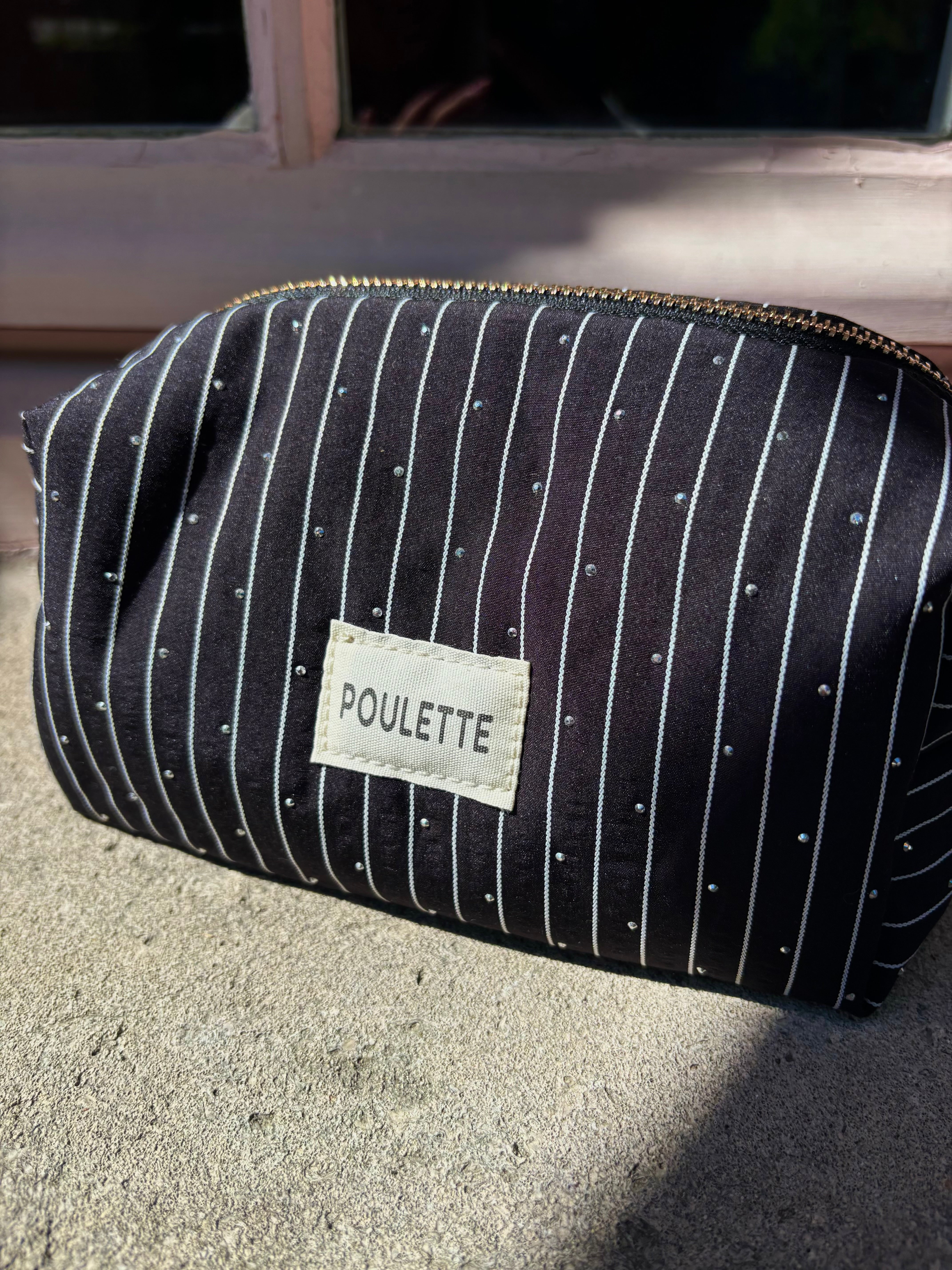 Trousse de toilette noir à rayures et stras