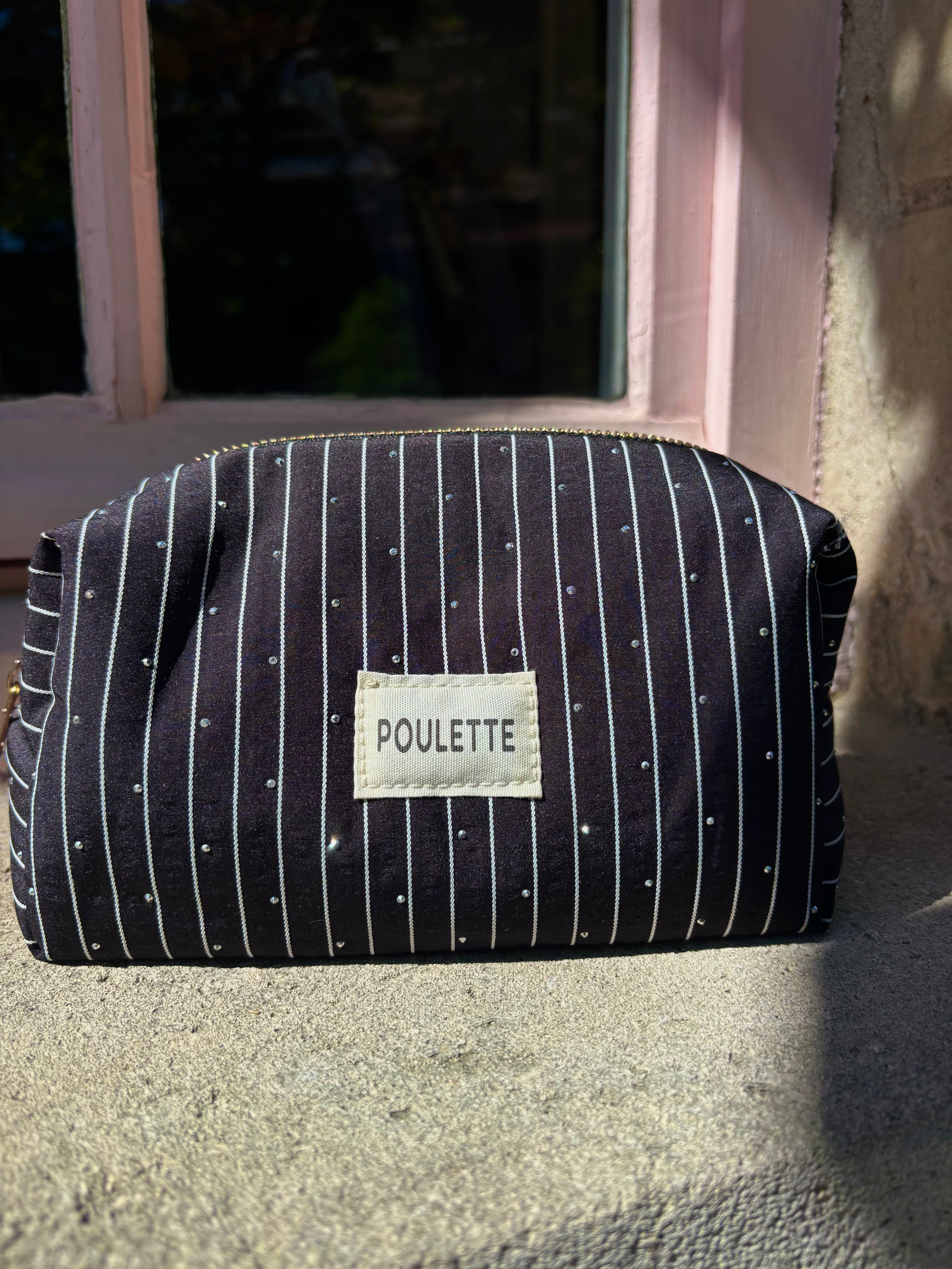Trousse de toilette noir à rayures et stras