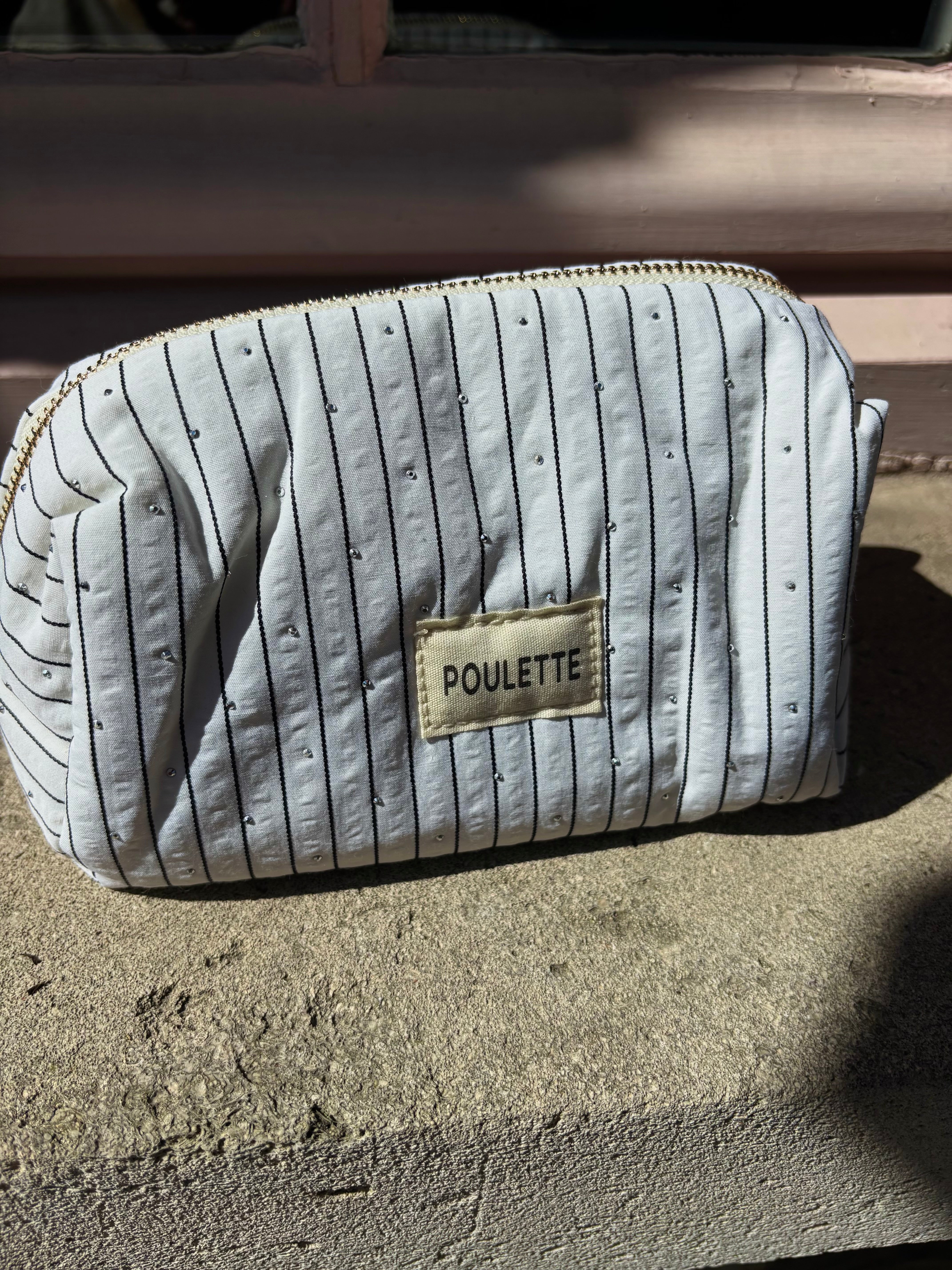 Trousse de toilette blanc à rayures et stras