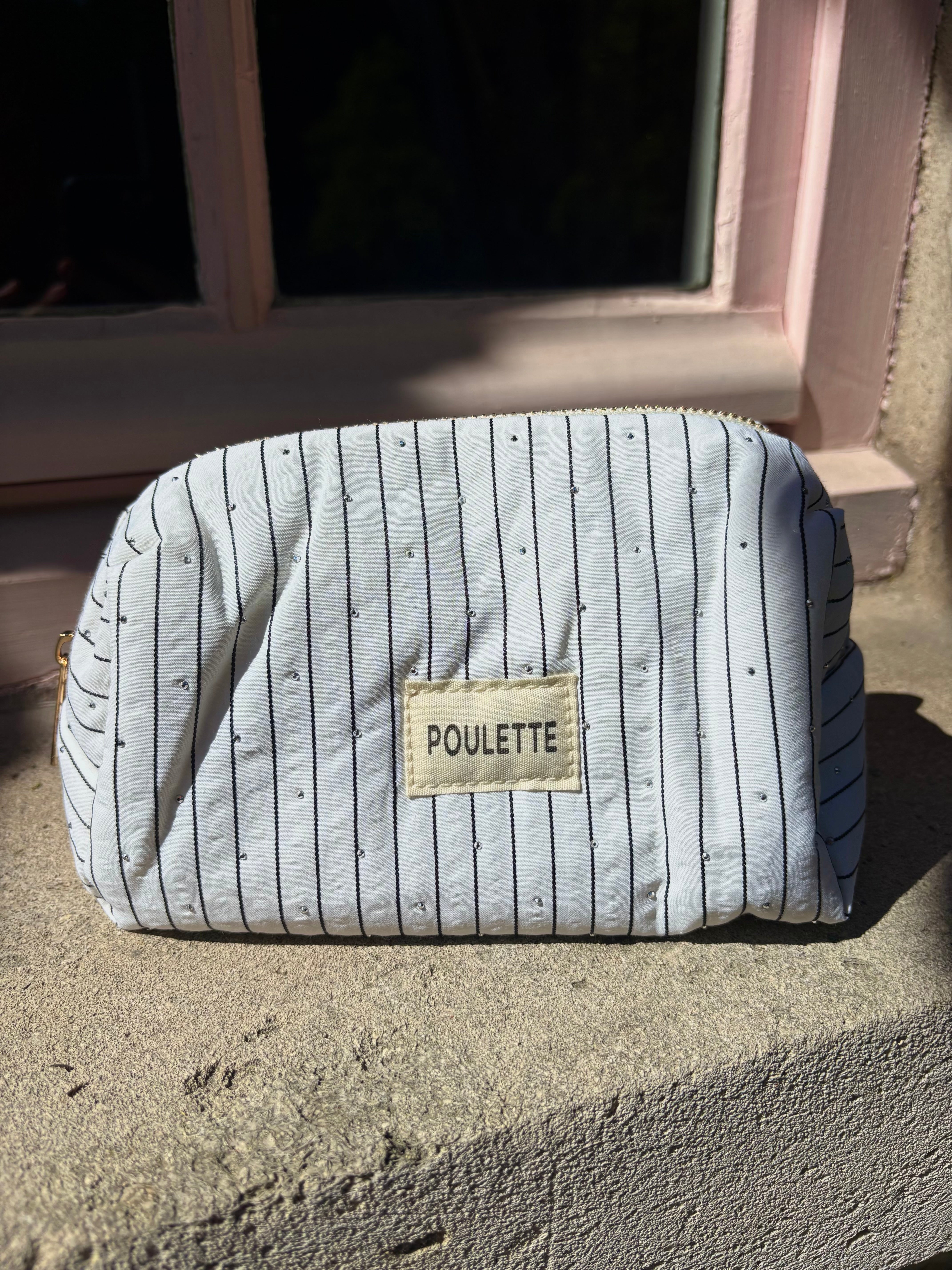 Trousse de toilette blanc à rayures et stras